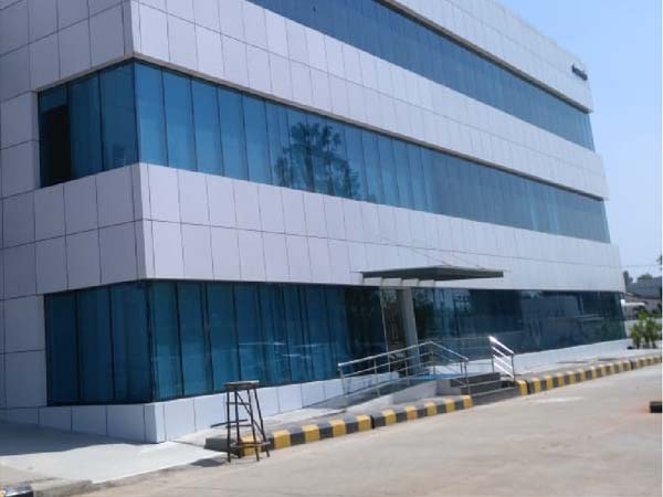 Ananthi interiors - Aluminium Doors and Windows - ACP Front Elevation - Santhosapuram, Chennai.